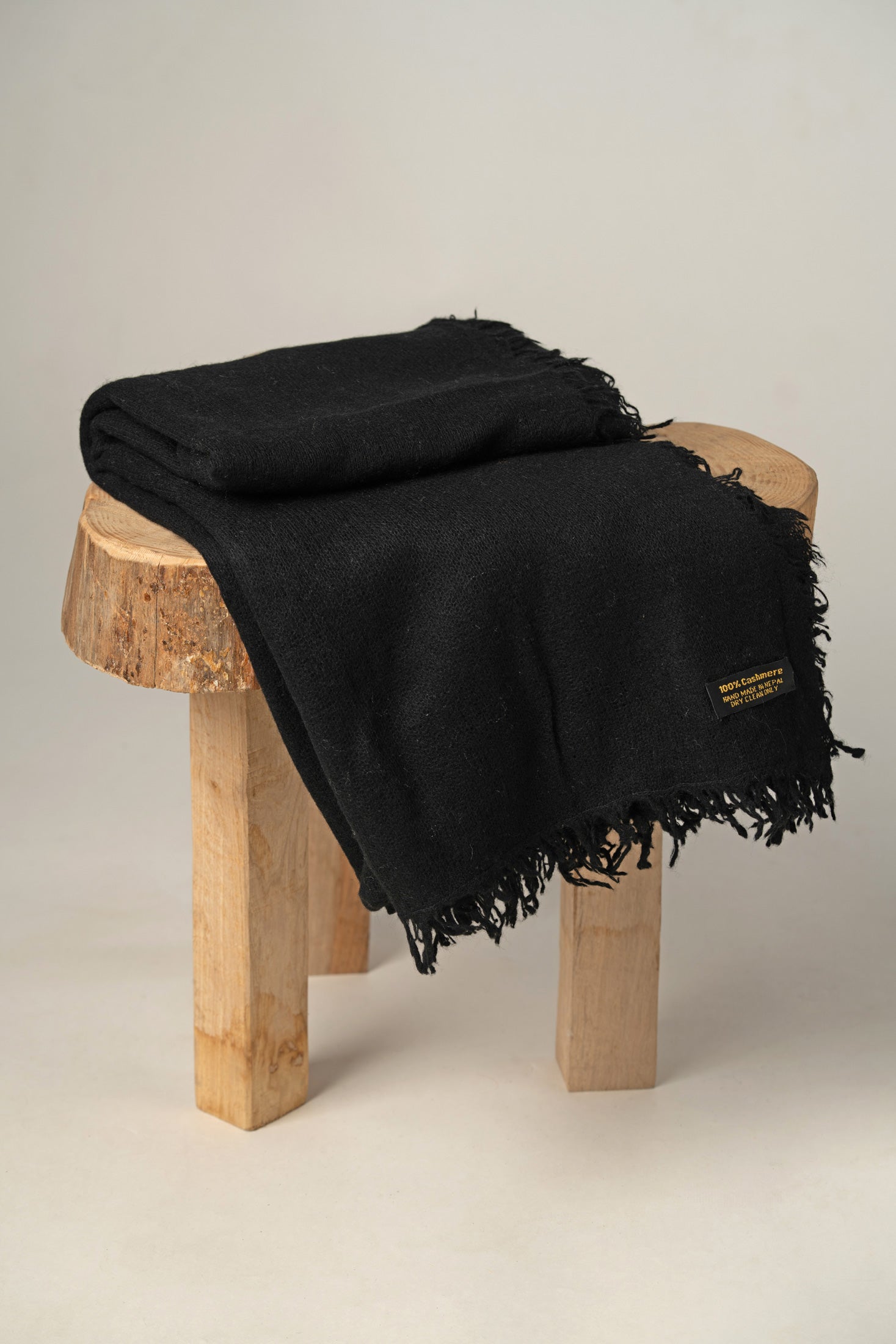 Black open-knit cashmere stole with frills all side