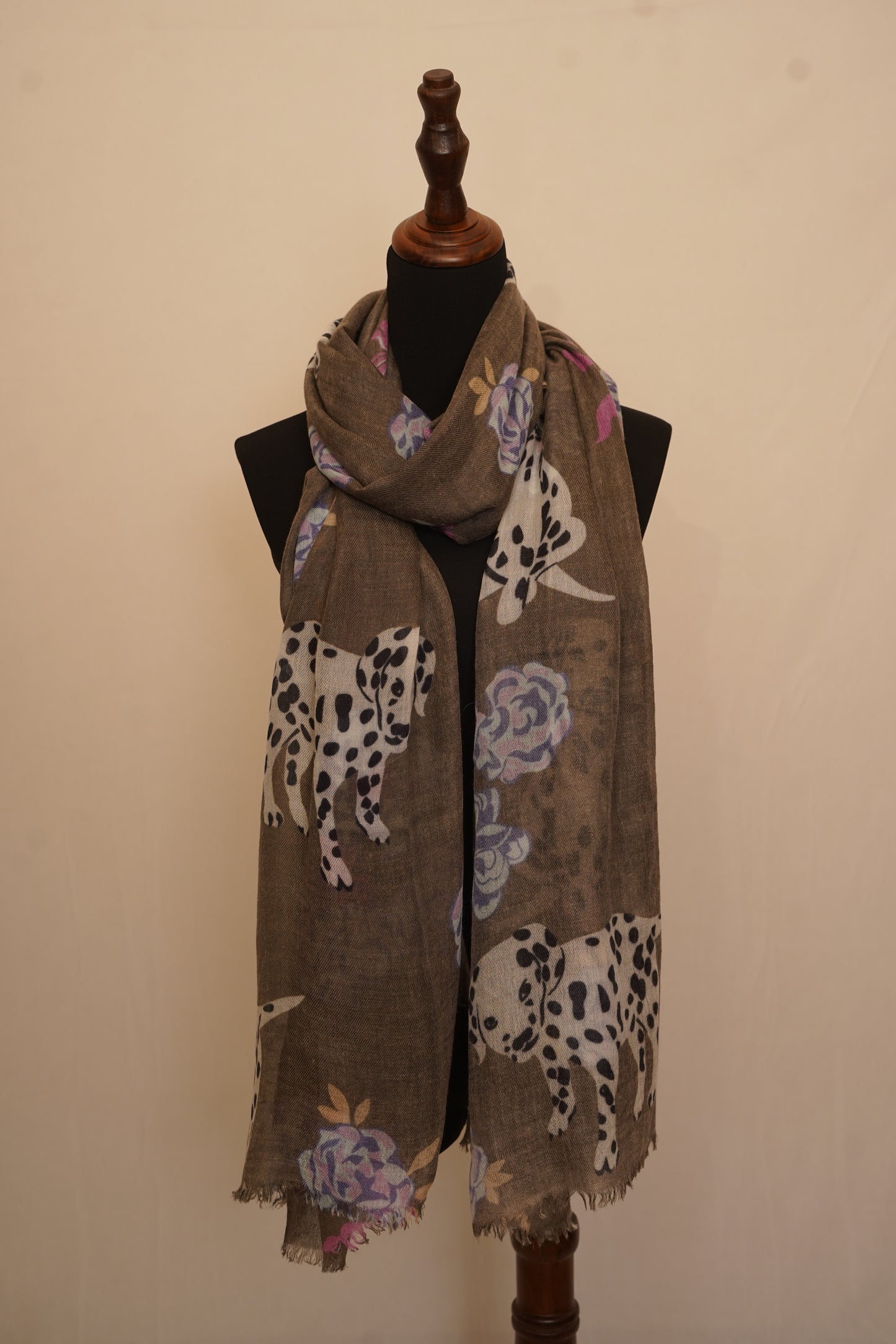 A beautiful designer cashmere shawl inspired by dogs and flowers.