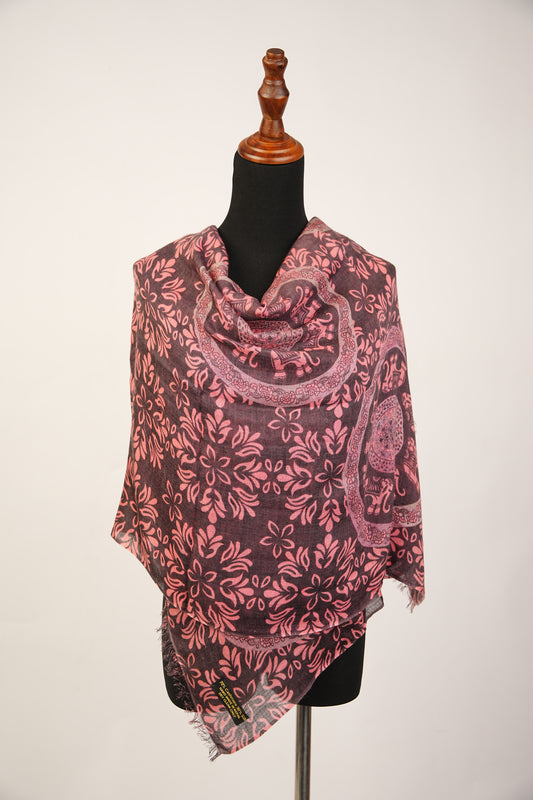 A sophisticated shawl made of cashmere and silk with an elephant print.