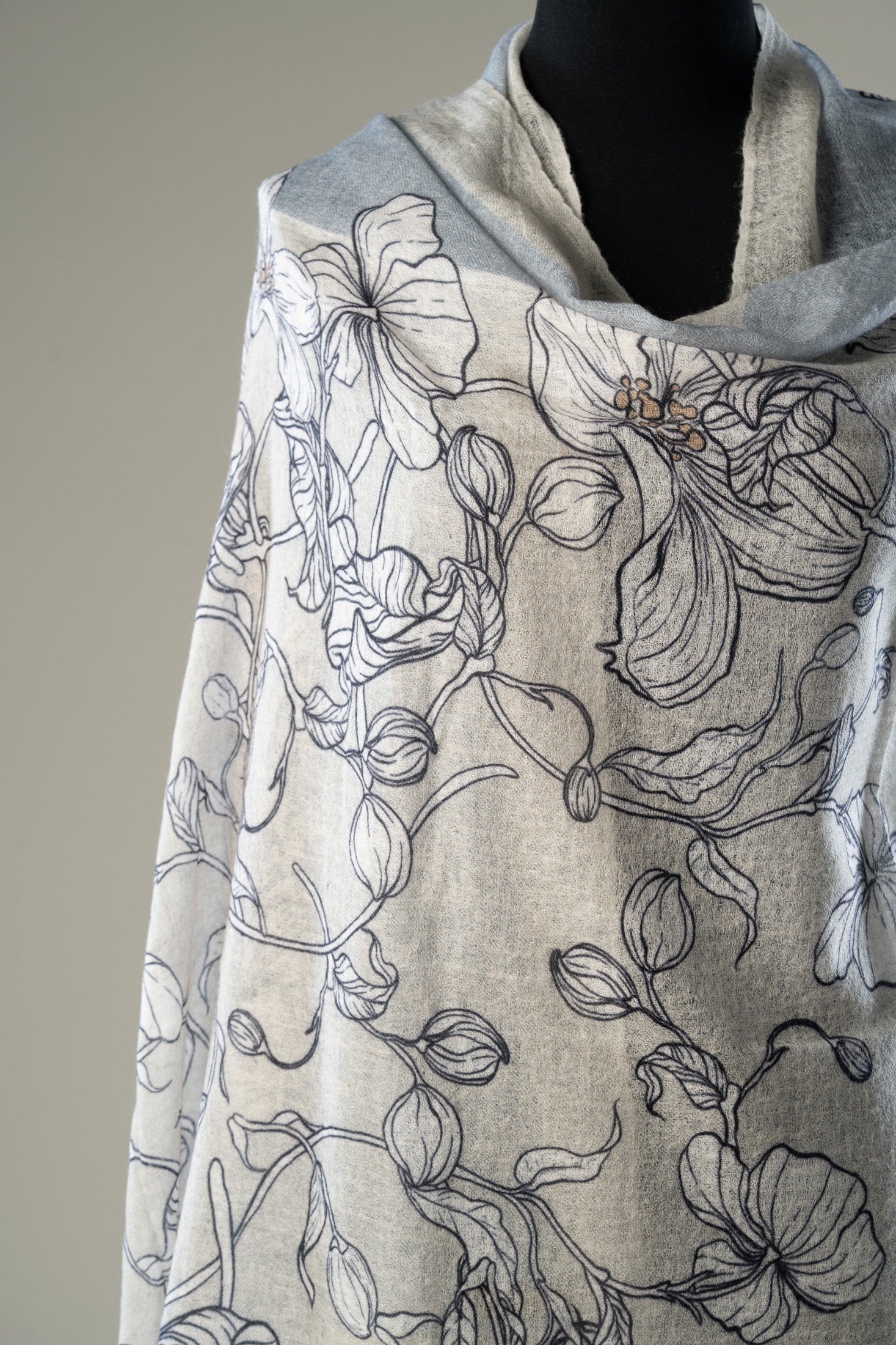 Luxury handwoven designer wrap in ice blue flowers print made of cashmere