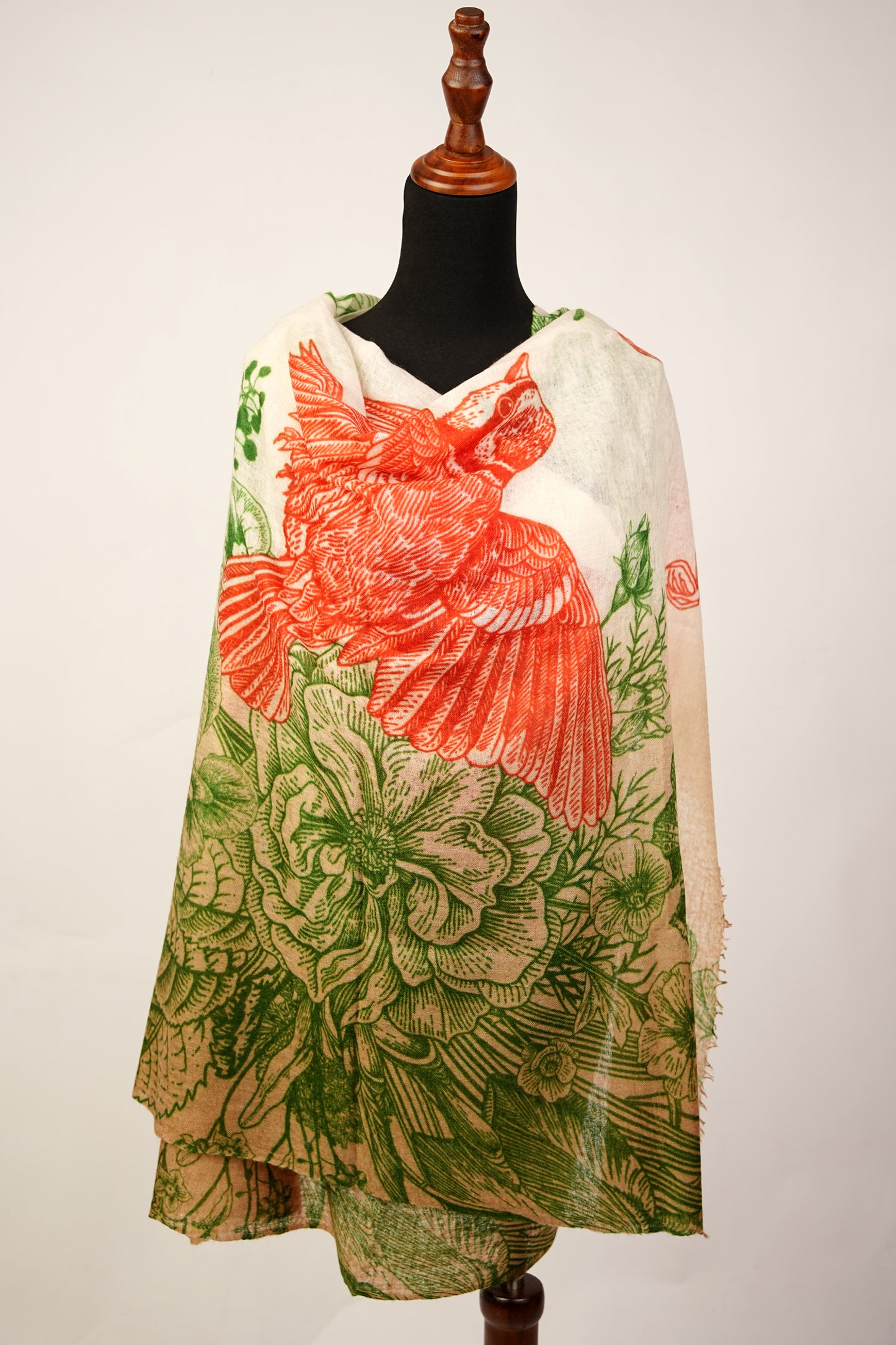 This is a vibrant mud green and orangey red cashmere shawl with a flower print