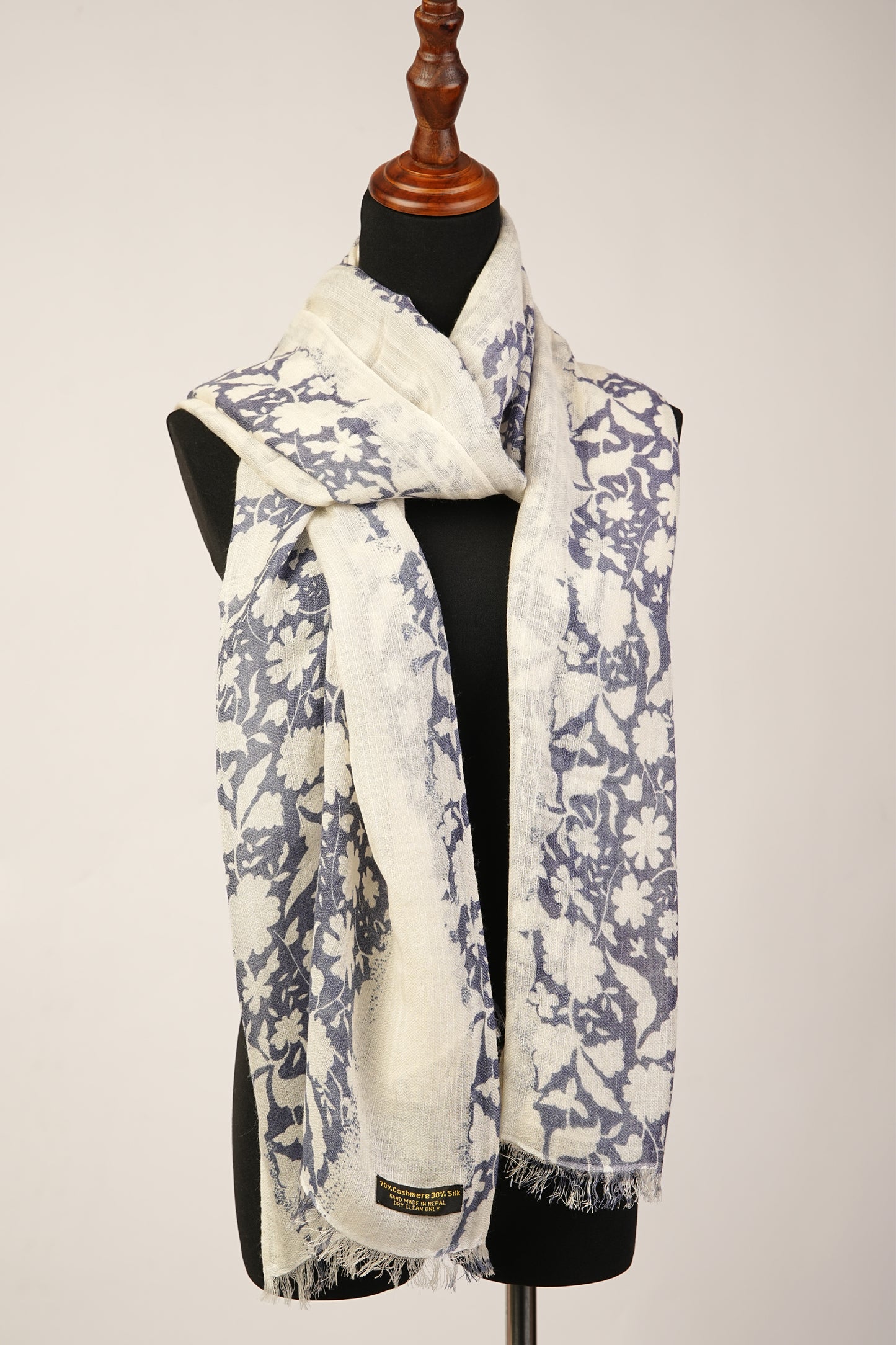 Fall cashmere shawl features a cream floral print